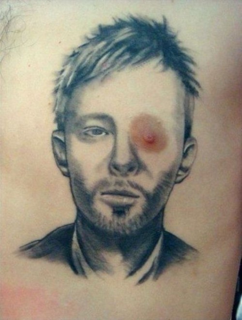 A nipple in the eye-12 Funniest Nipple Tattoos Ever Done On Humans 
