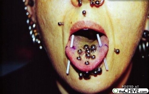 Just too much-Bizarre Tongue And Tooth Piercings
