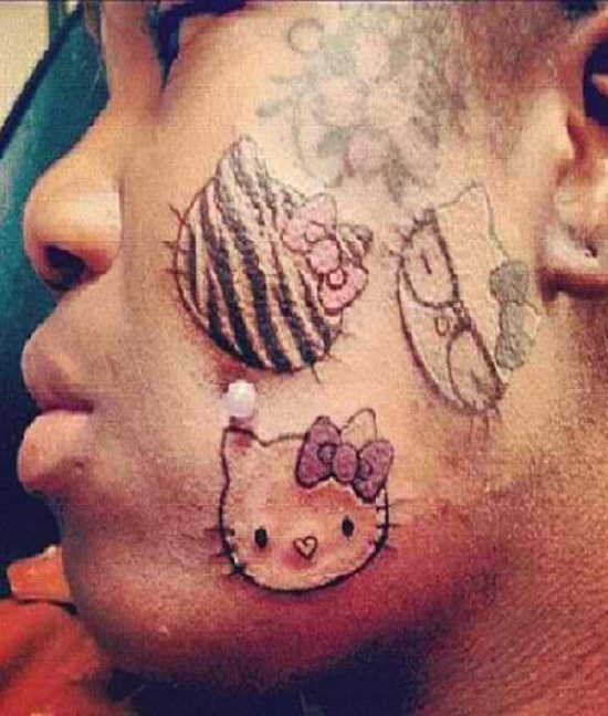 Hello kitty fan-Ugliest Face Tattoos