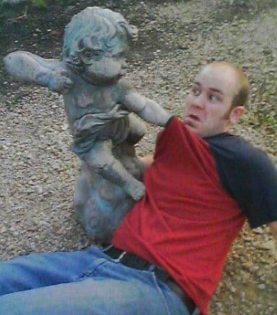 Uh Oh!-People Being Nasty With Statues