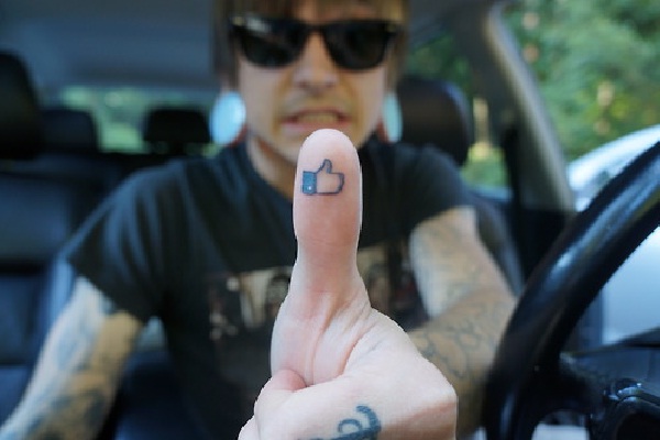 Thumbs Up-Wackiest Internet Inspired Tattoos