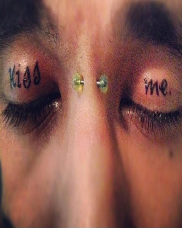 Kiss me-Weirdest Eyelid Tattoos