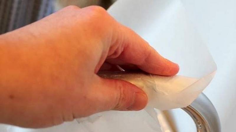 Use Wax Paper to Keep Your Faucets Clean and Shining-15 Home Cleaning Hacks That Make Cleaning Easy