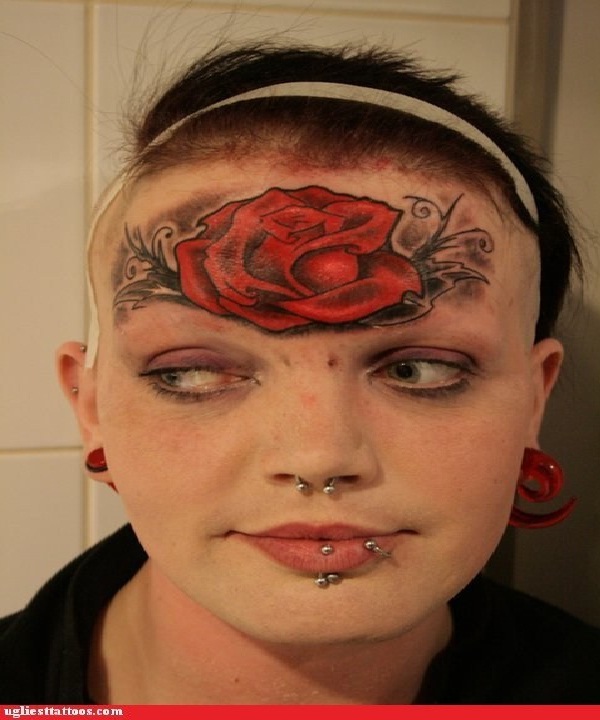 A rose?-Bizarre Forehead Tattoos