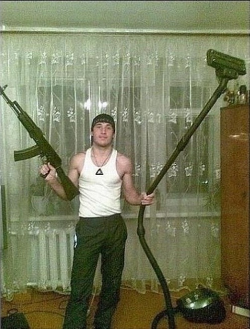 A gun and a vacuum cleaner?-Scary Russian Dating Site Pictures
