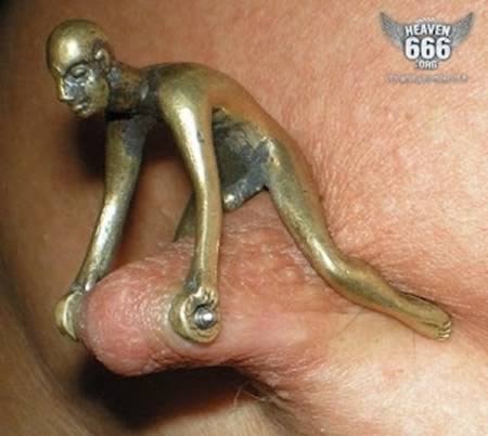 A mounted nipple-12 Funniest Nipple Tattoos Ever Done On Humans 