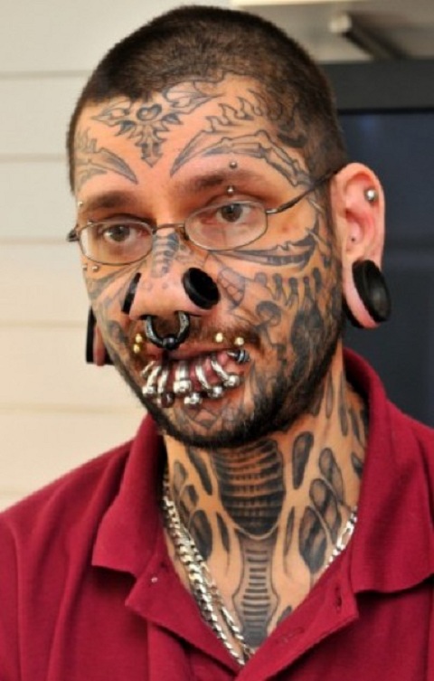 Full face and lip piercing-Ugliest Face Tattoos