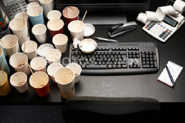 A Ton of Empty Coffee Cups On Your Desk-Hungover At Work Signs