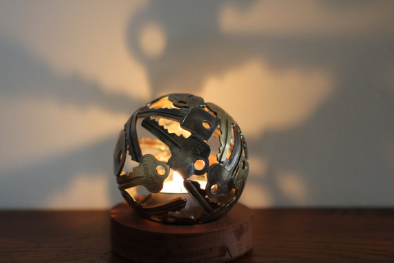 A Small Sphere Shaped Tea Light Holder-15 Beautiful Items That Are Carved Out Of Scrap