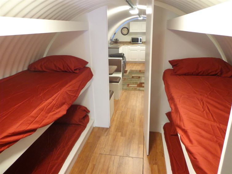 Bunk Beds to Fit More People in This House-Awesome House Built In An Underground Pothole