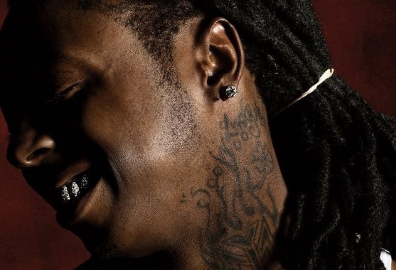 Soo Woo Tattoo Under His Left Ear For His Bloods-15 Bizarre Lil Wayne's Tattoos And Their Meanings
