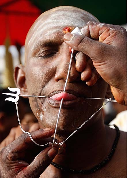Hindu Customs-Bizarre Tongue And Tooth Piercings