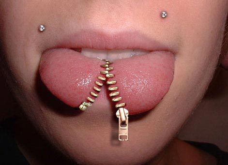 Zip It!-Bizarre Tongue And Tooth Piercings