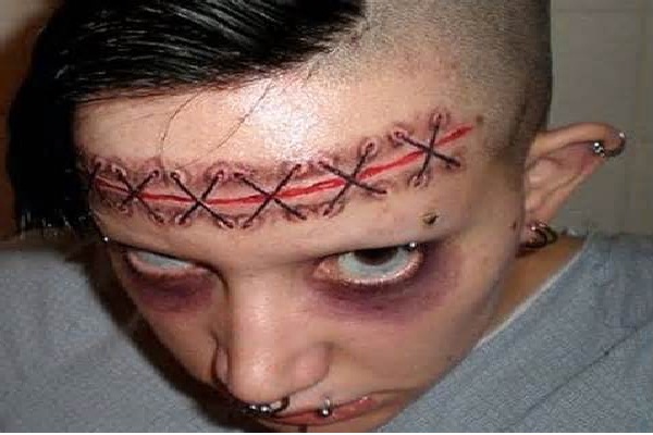 Brain removal-Bizarre Forehead Tattoos