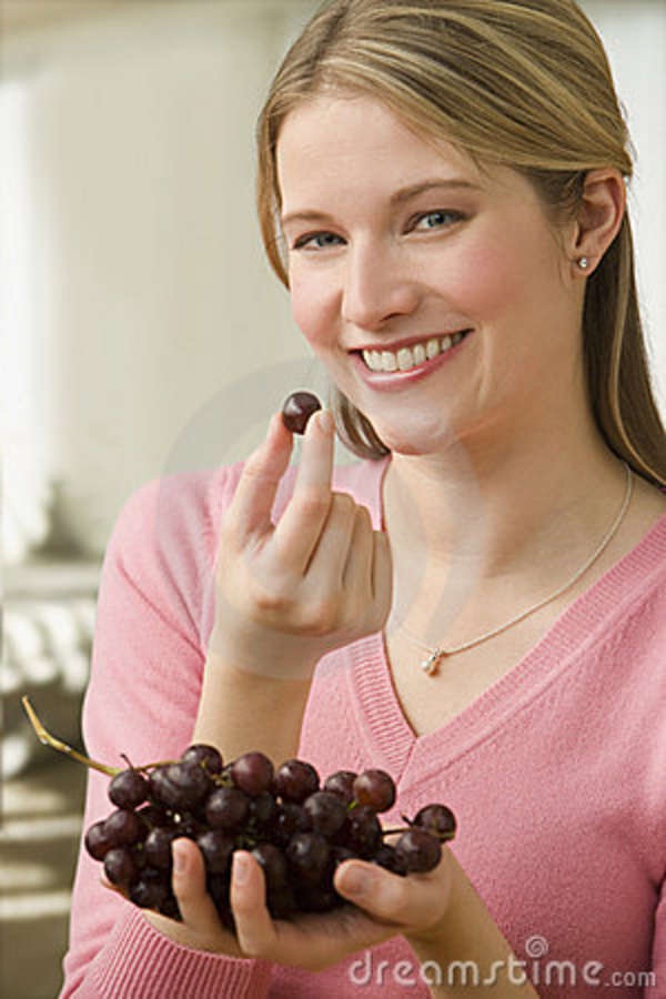 Eating grapes-Bizarre New Year Traditions Around The World