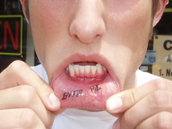 Bite Me-15 Worst Lip Tattoos Ever