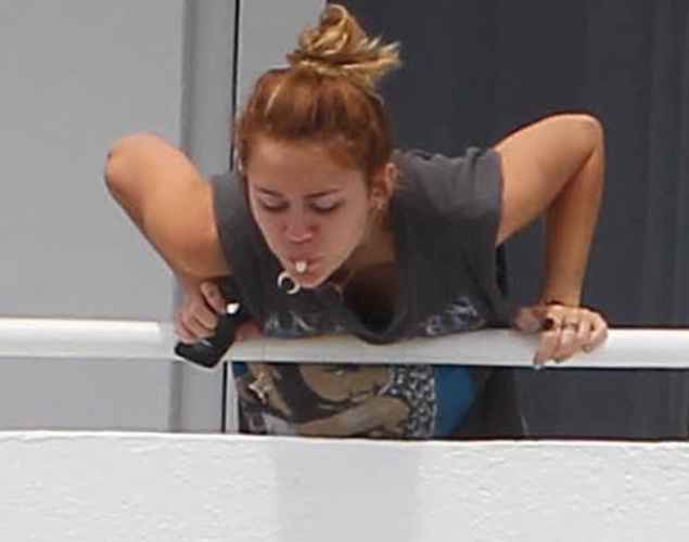 The spit-Embarrassing Pictures Of Miley Cyrus