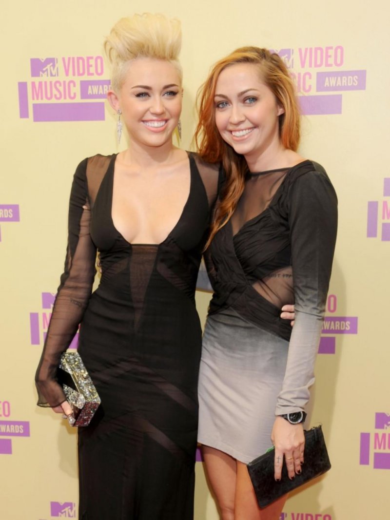 Miley Cyrus-15 Celebrities With Their Better Looking Siblings