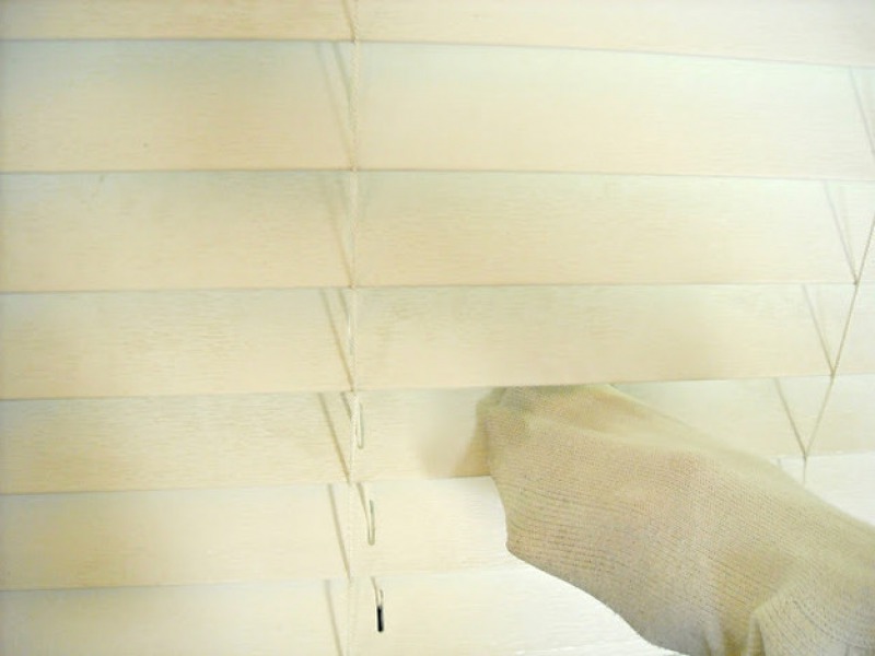 Clean Window Blinds Using Orphan Sock-15 Home Cleaning Hacks That Make Cleaning Easy