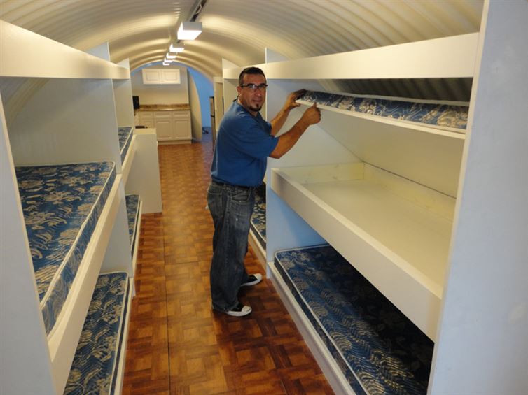 Storage Space of Extra Bunk Beds-Awesome House Built In An Underground Pothole