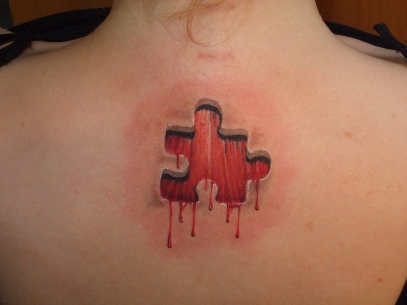 Bloody Back-12 Amazing 3D Puzzle Tattoos Ever