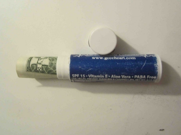 Turn Your Empty Lip Balm into a Mini Cash Holder-Travel Hacks To Simplify Your Trips