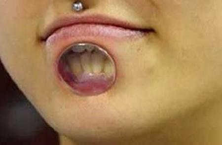 Ew!-Bizarre Tongue And Tooth Piercings