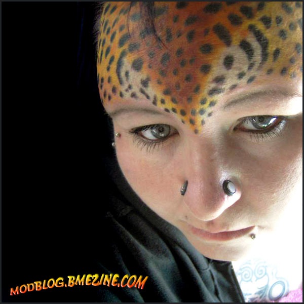 Leopard head-Bizarre Forehead Tattoos