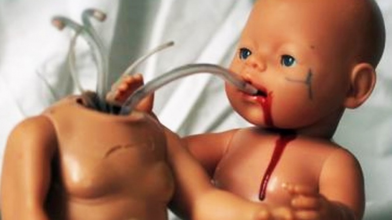The Doll of a Baby that Sucks Blood from another Baby-15 Children Toys That Are Inappropriate On So Many Different Levels