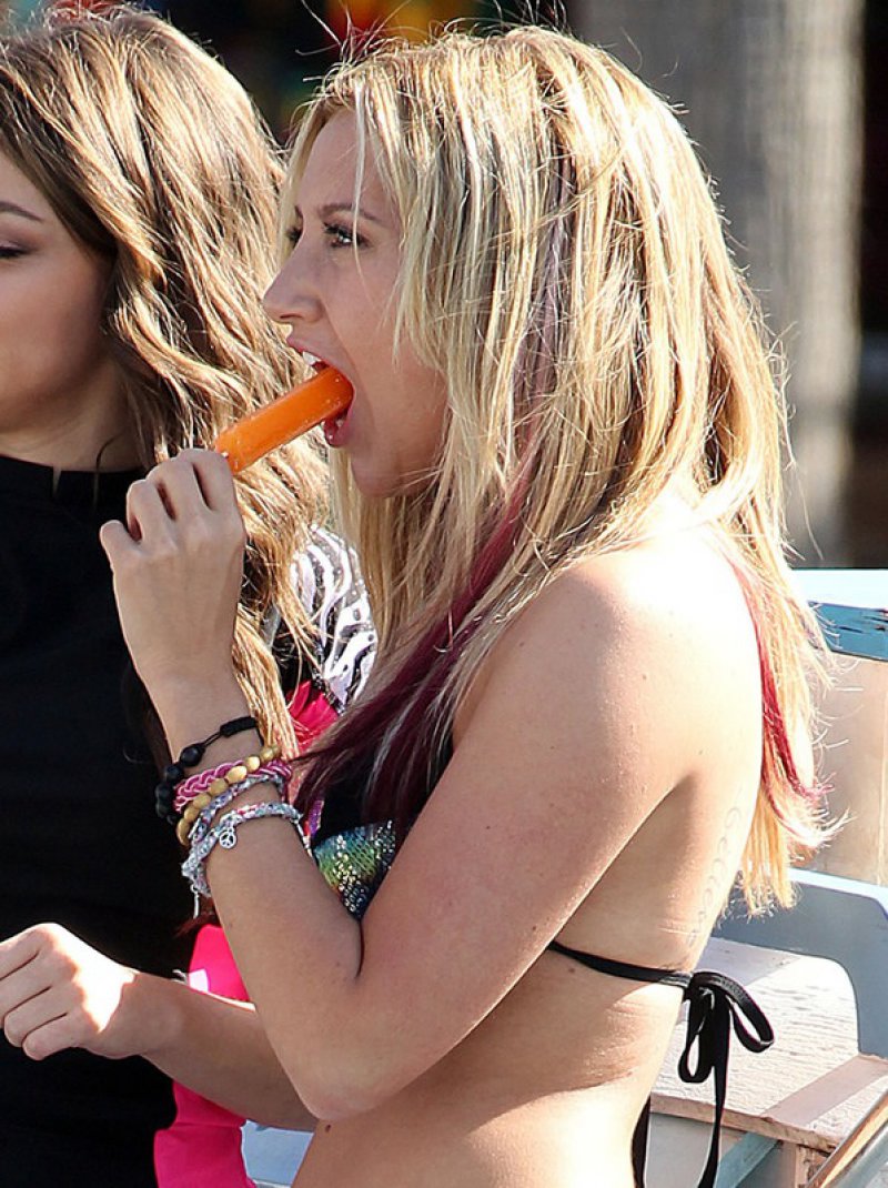 Ashley Tisdale-12 Hot Pictures Of Female Celebrities Sucking On A Popsicle