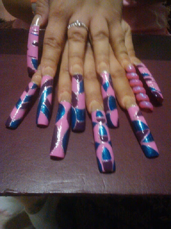 Long and insane nails-15 Amazing Nail Arts That You Must Try Once In Your Life