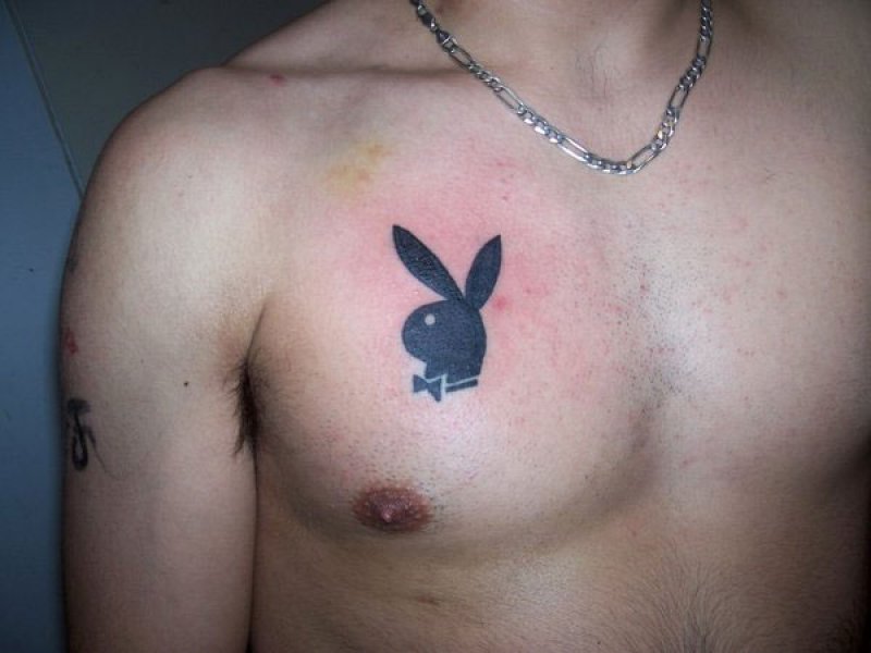 Playboy Chest Tattoo.