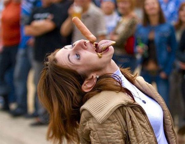 Sausage eating gone wild-Perfectly Timed Mind Blowing Photos