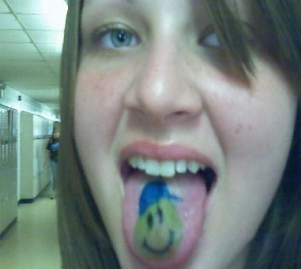 Smiley face tongue tat-Weirdest Tongue Tattoos