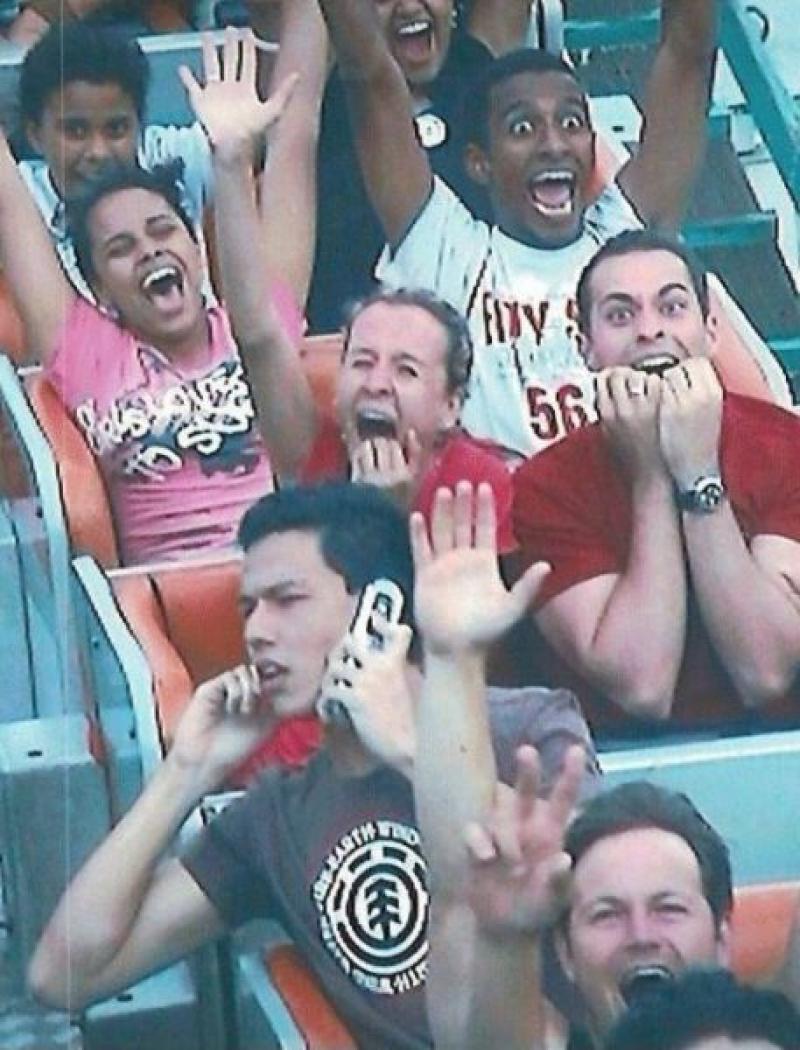 Taking A Call-12 Funniest Rollercoaster Pictures 