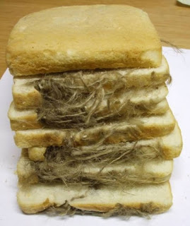 Oven Glove In Loaf Of Bread-15 Most Disgusting Things People Ever Found In Their Food