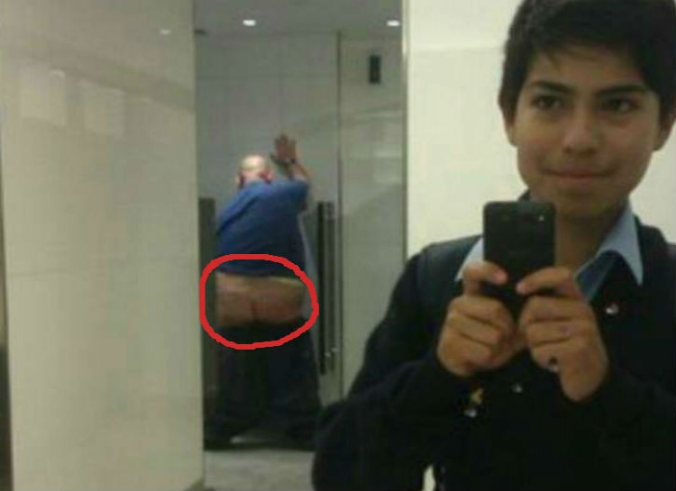 Be Aware of Your Surroundings While Taking a Selfie-15 Strangest Moments Ever Caught In Restrooms