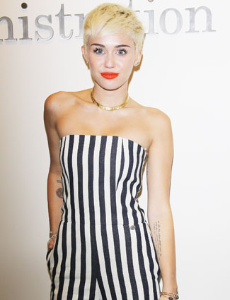Miley Cyrus tattoo fail!-Worst Celebrity Tattoos Ever