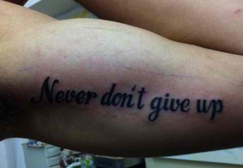 Never-giveup-15 Worst Tattoo Spelling Mistakes Ever
