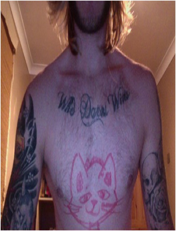 Red Cat Tattoo-Top 15 Worst Chest Tattoos Ever