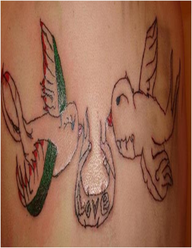 Shaky Birds Tattoo-Top 15 Worst Chest Tattoos Ever