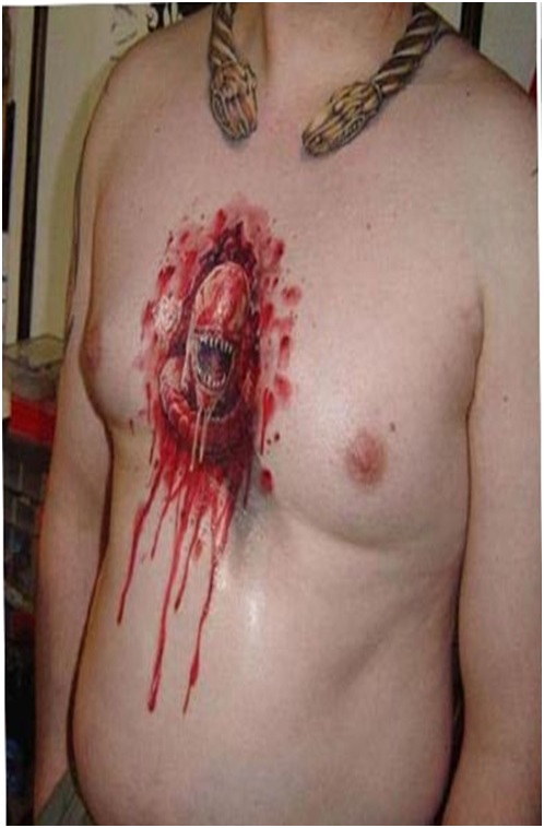 Alien Breaks Free Tattoo-Top 15 Worst Chest Tattoos Ever
